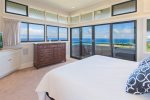 Perched upstairs, the master bedroom serves as a tranquil haven for relaxation